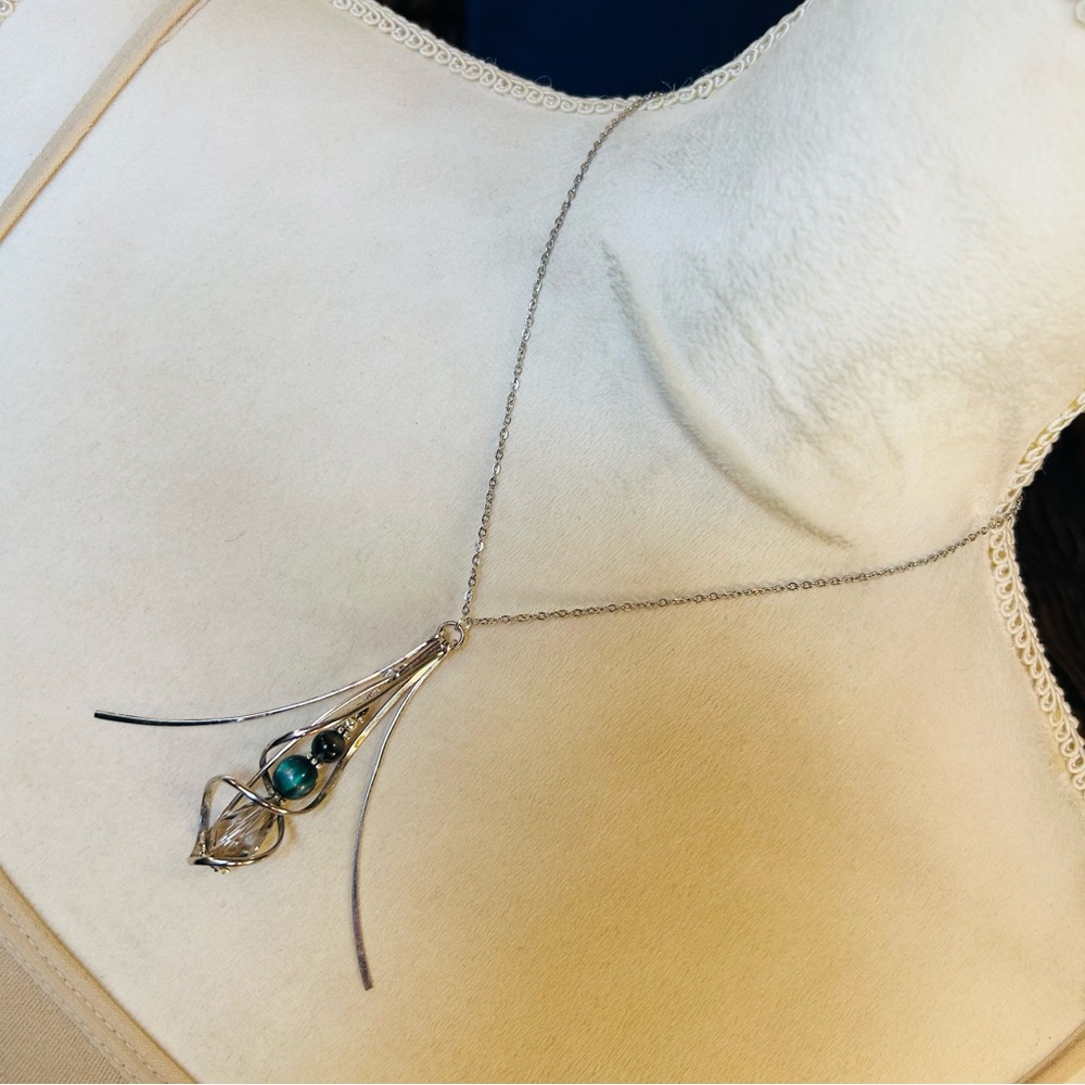 Handcrafted faceted rutilated quartz caged fringe pendant on chain necklace
